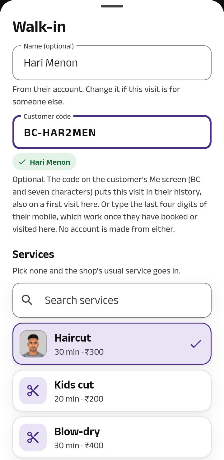 The walk-in sheet: the name filled from the customer's account, the customer code typed in, and Services below.